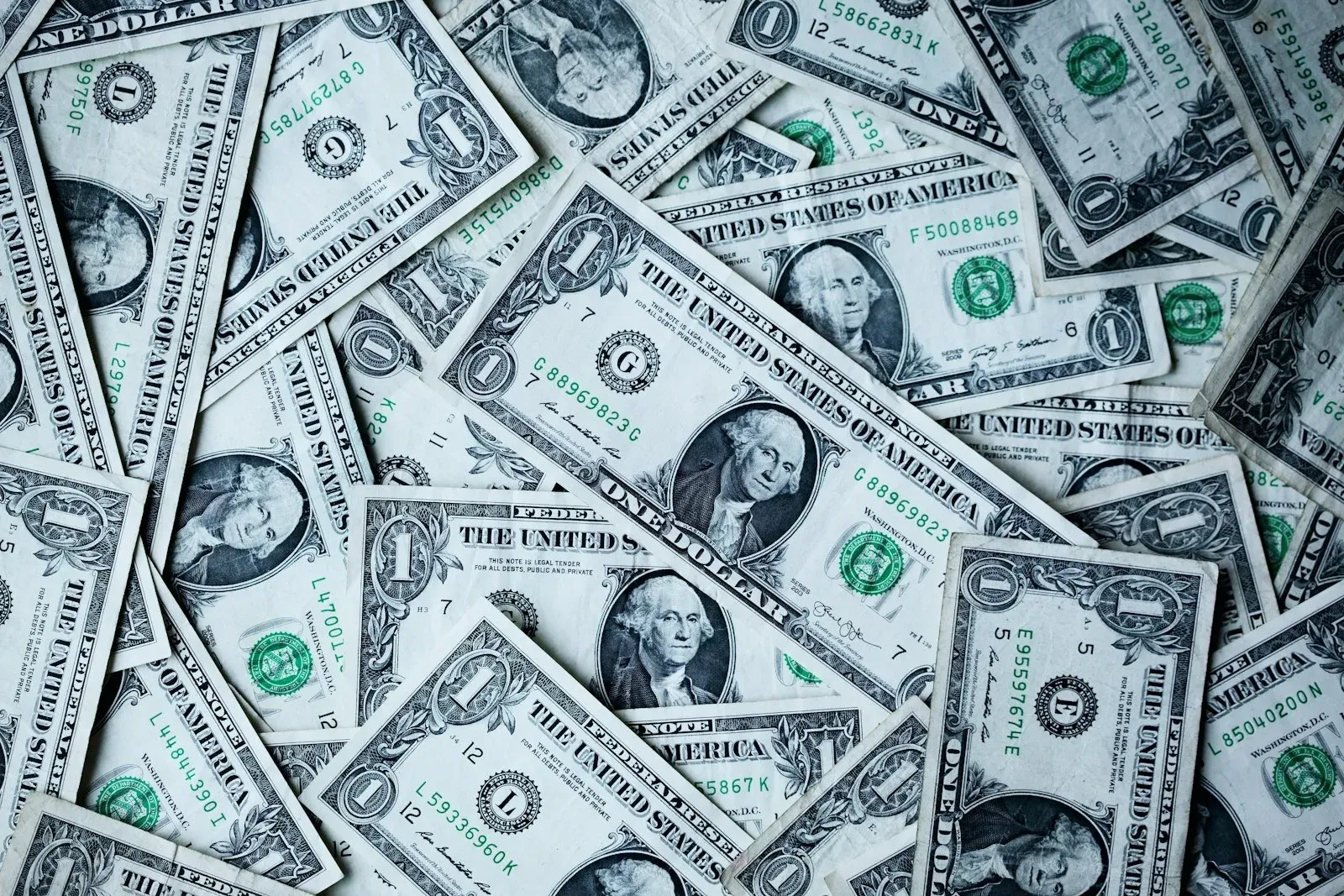 Cheapest way to send money to Thailand fees US dollar banknotes representing the cost of sending money to Thailand