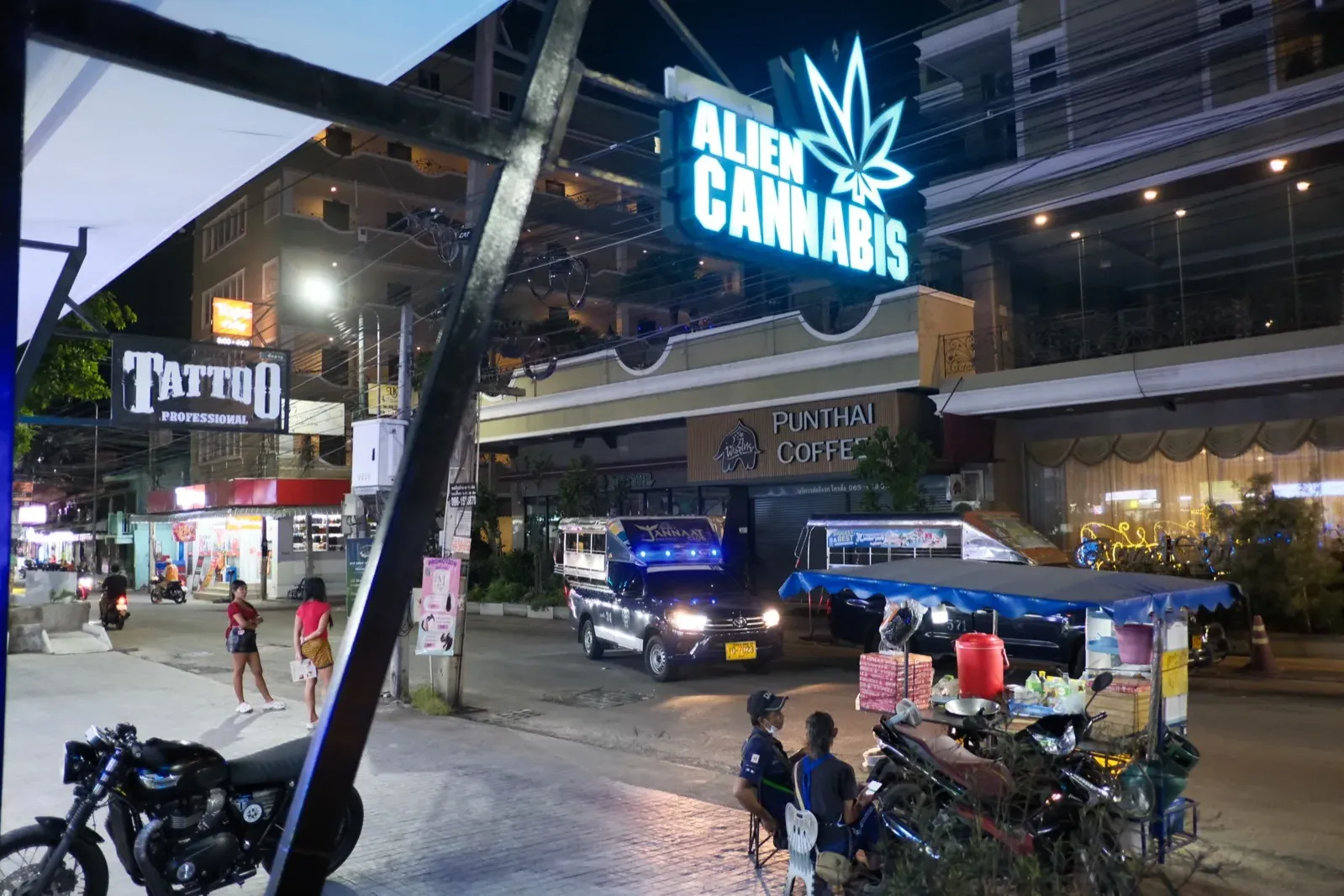 Thai street scene with cannabis shop signage as dispensaries close under new rules