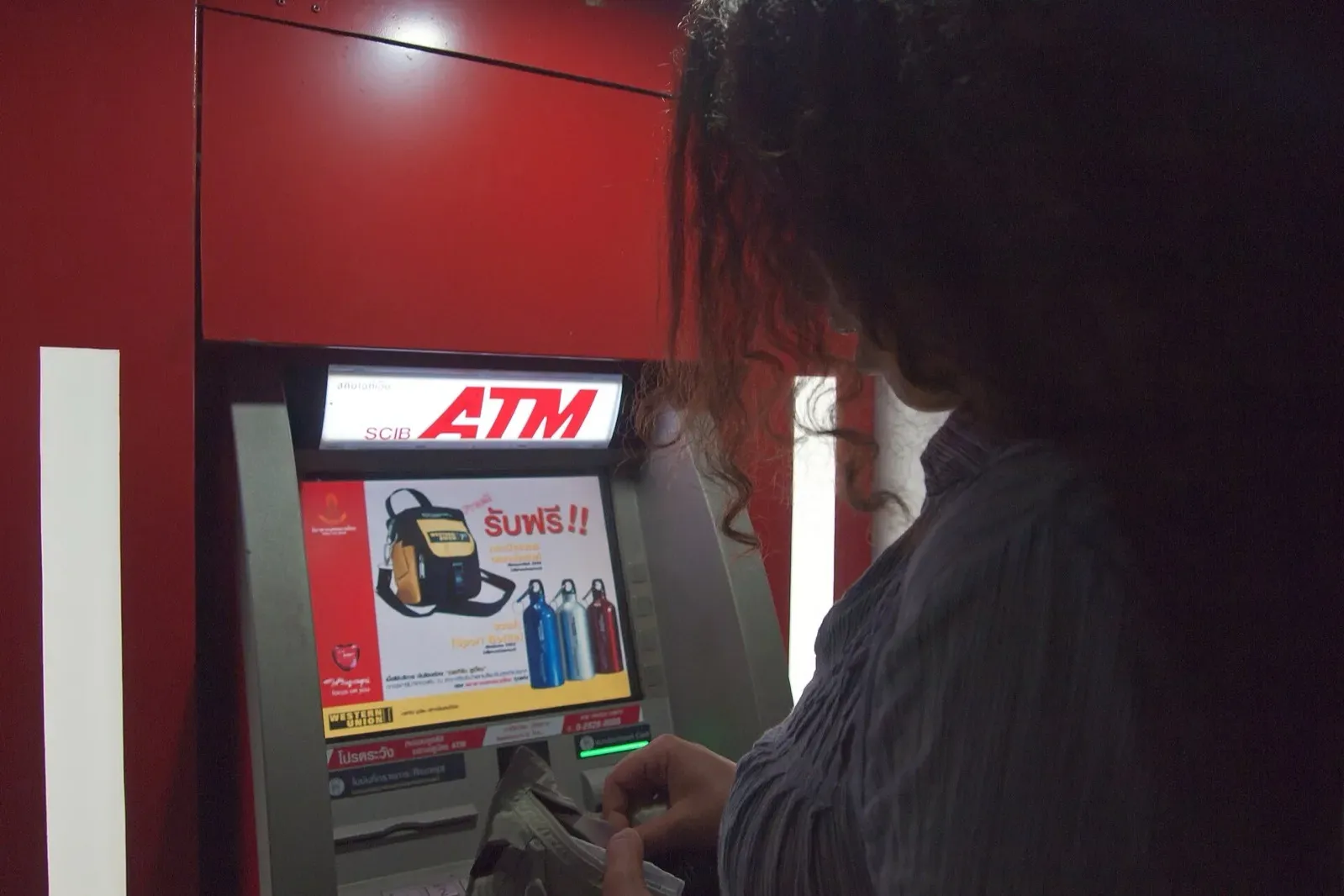 Thailand ATM fee for a foreign card A row of Thai bank ATMs where foreign cards pay the Thailand ATM fee to withdraw cash