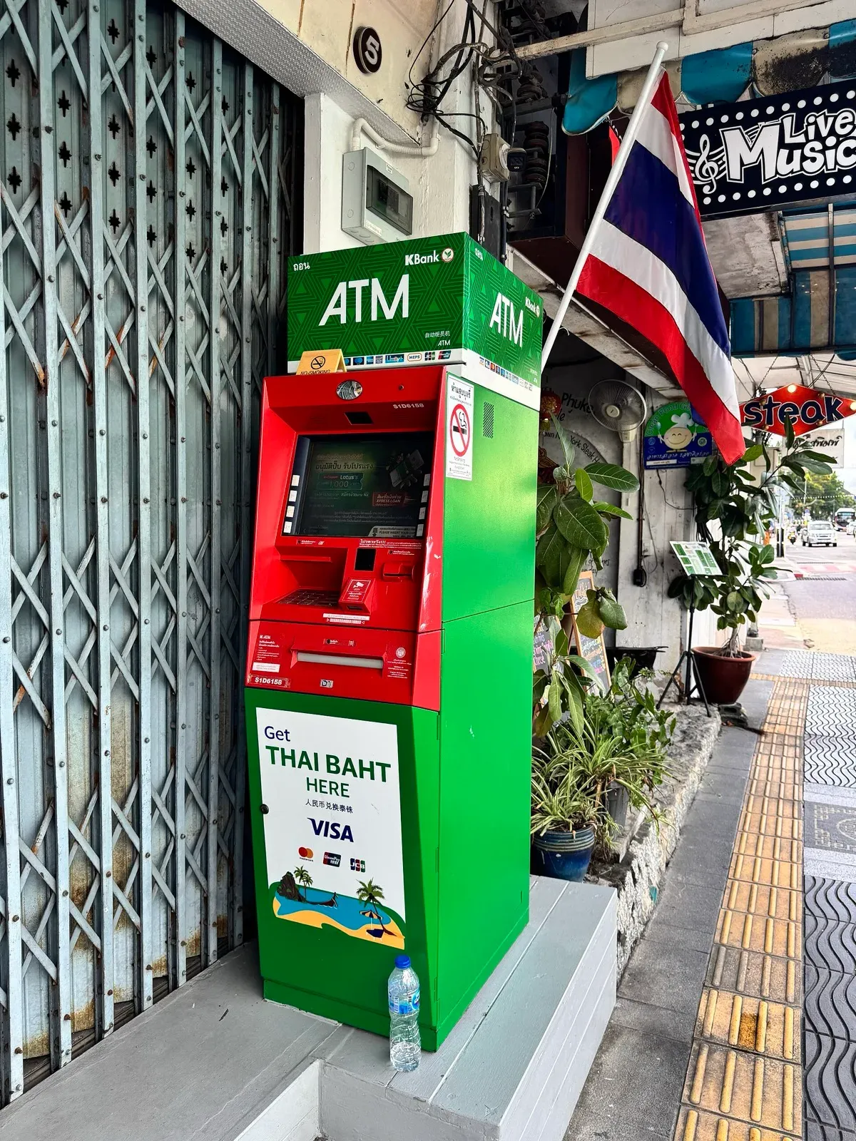 Thailand tourist prepaid card at a KBank ATM A green Kasikornbank ATM in Phuket where a Thailand tourist prepaid card can withdraw baht