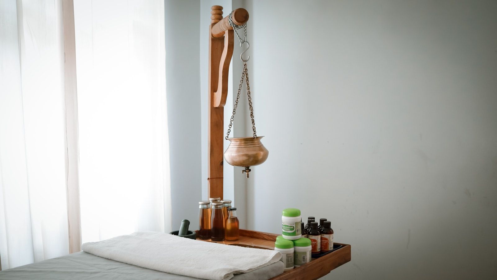 A shelf of natural spa and traditional-remedy products in Thailand