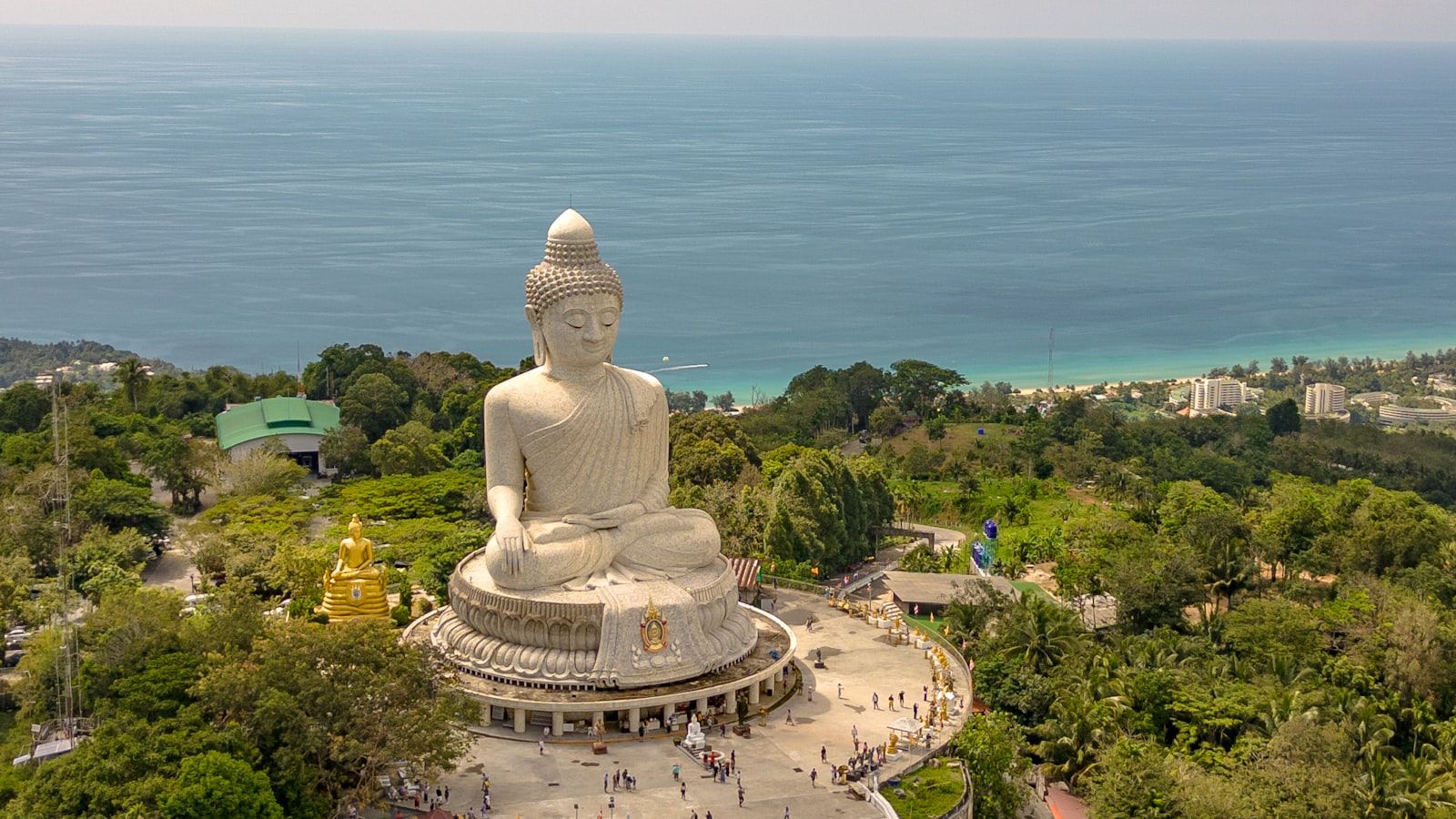 Phuket's Big Buddha statue overlooking the coast, a focal point for Buddhist holidays in July
