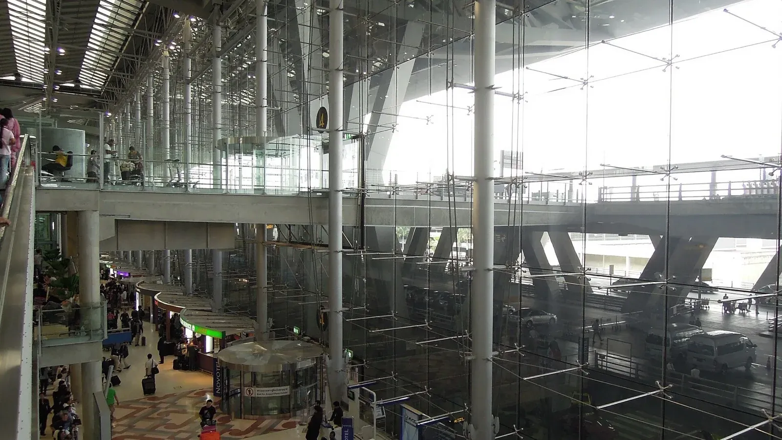 sim card thailand airport Airport arrivals hall in Thailand where SIM card counters register a tourist SIM to your passport