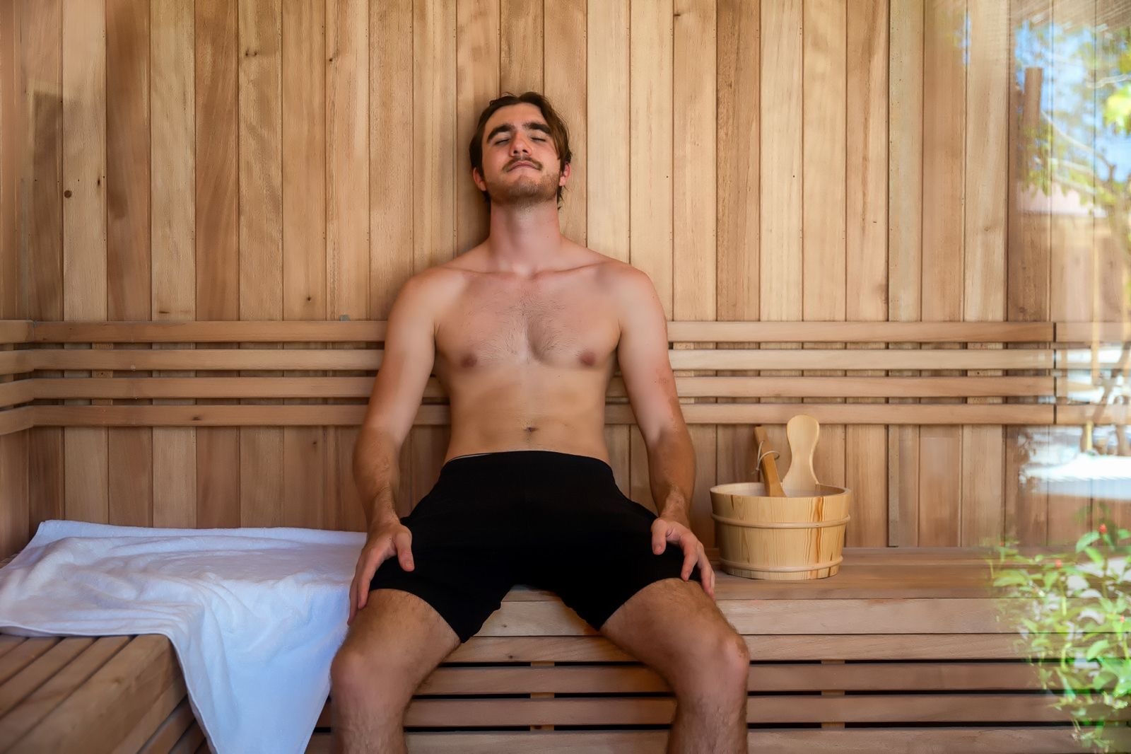 Guest relaxing in the Finnish sauna at Breathe Phuket thermal spa, Bang Tao, Phuket