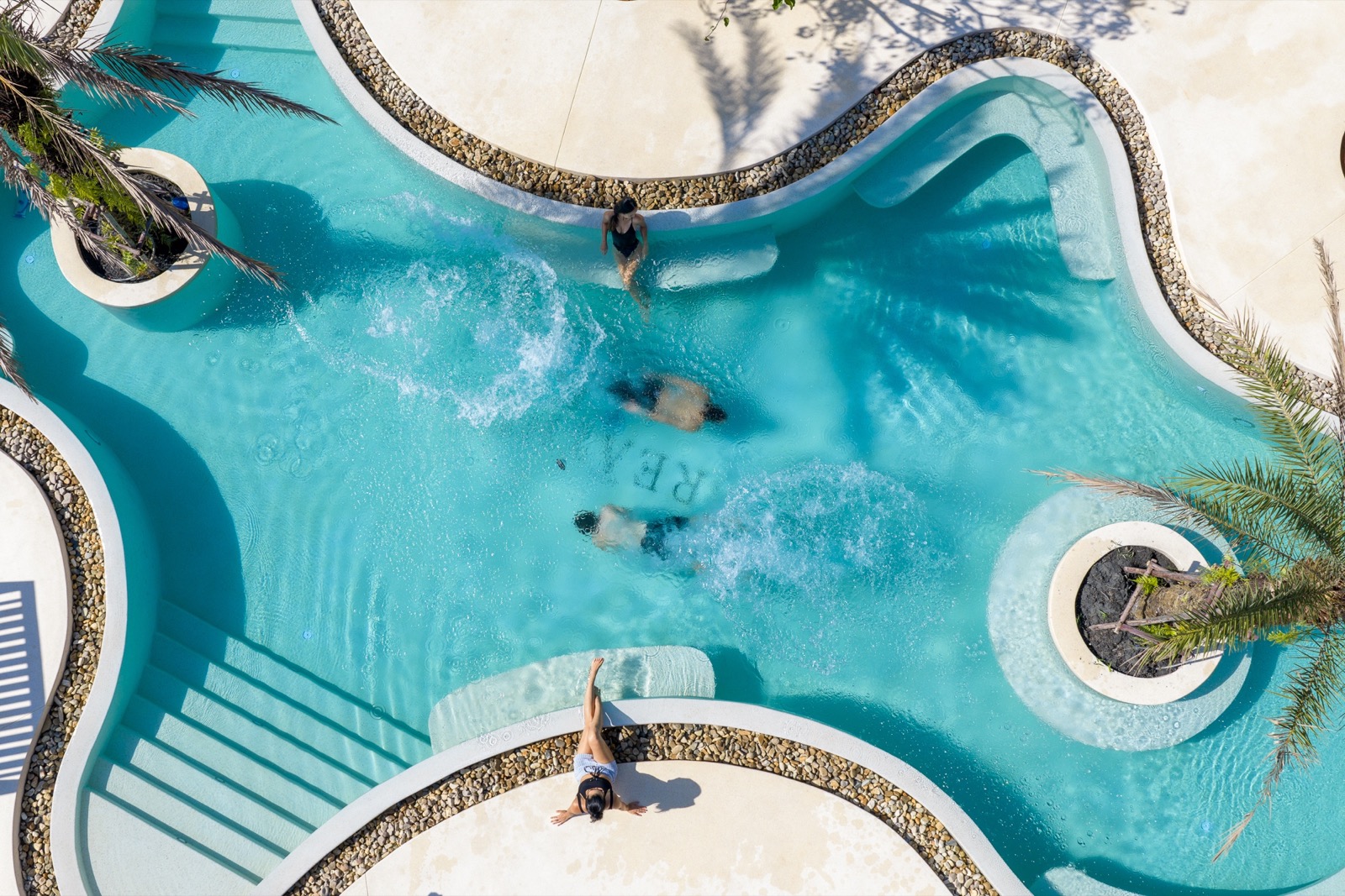 Aerial view of the open-air pool at Breathe Phuket wellness sanctuary, Bang Tao, Phuket