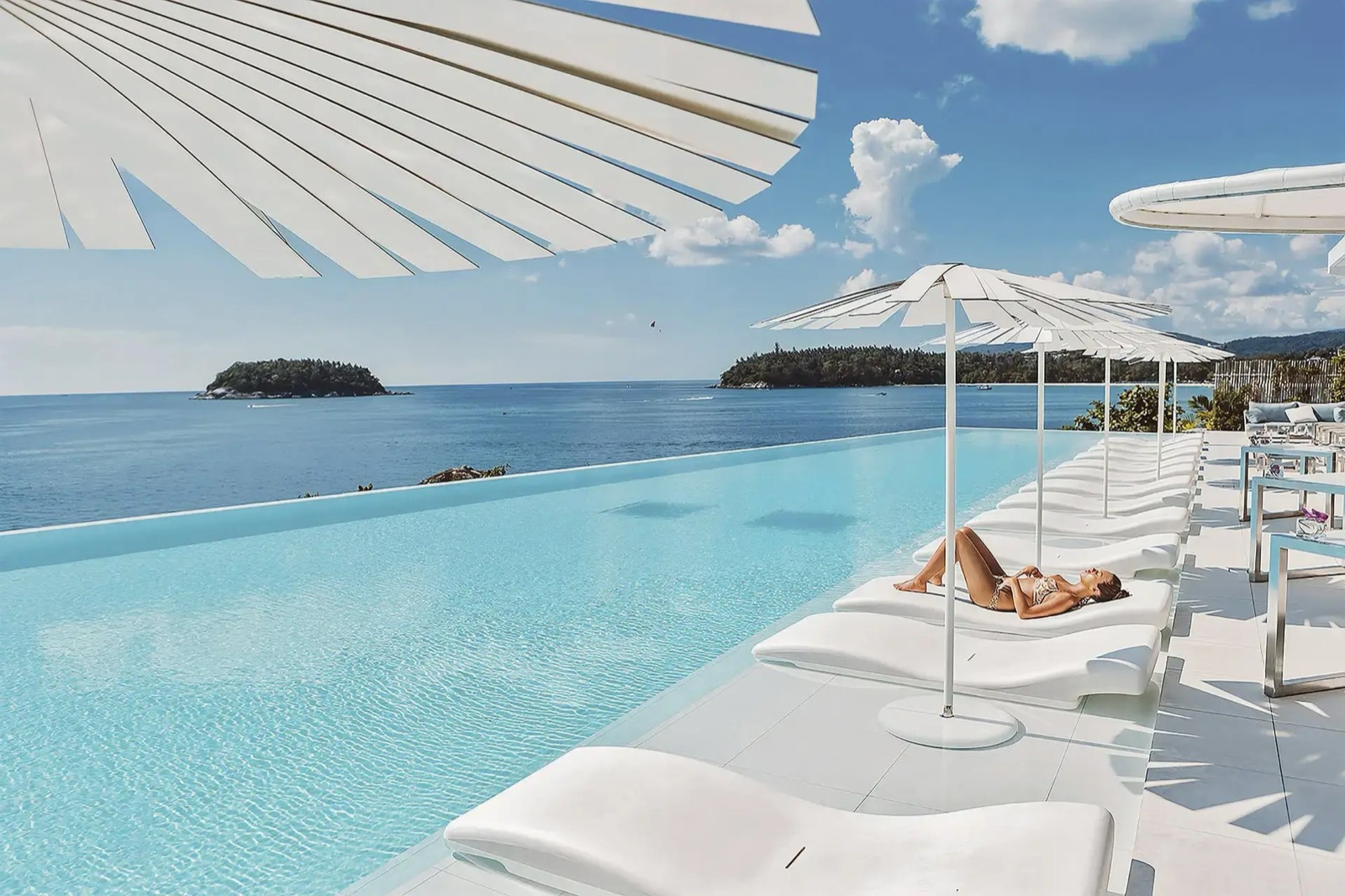 Clifftop infinity pool overlooking the Andaman Sea at Kata Rocks, Phuket