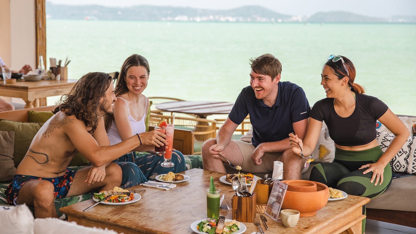 Oceanfront lounge dining at Selina Beach Club, Rawai, Phuket