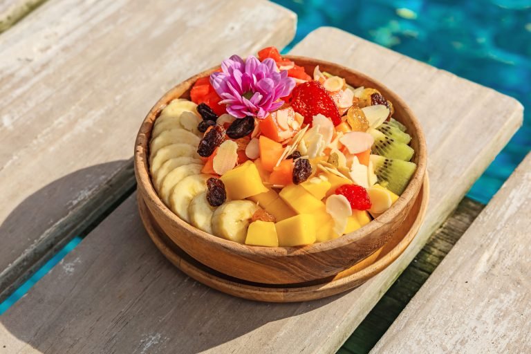 Fresh fruit bowl by the pool at The Lazy Coconut, Bang Tao, Phuket