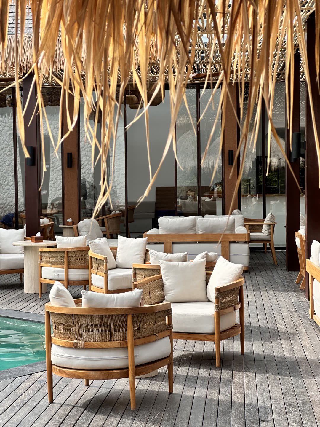 Pool deck lounge seating at ZIMA Spa & Wellness, Rawai, Phuket