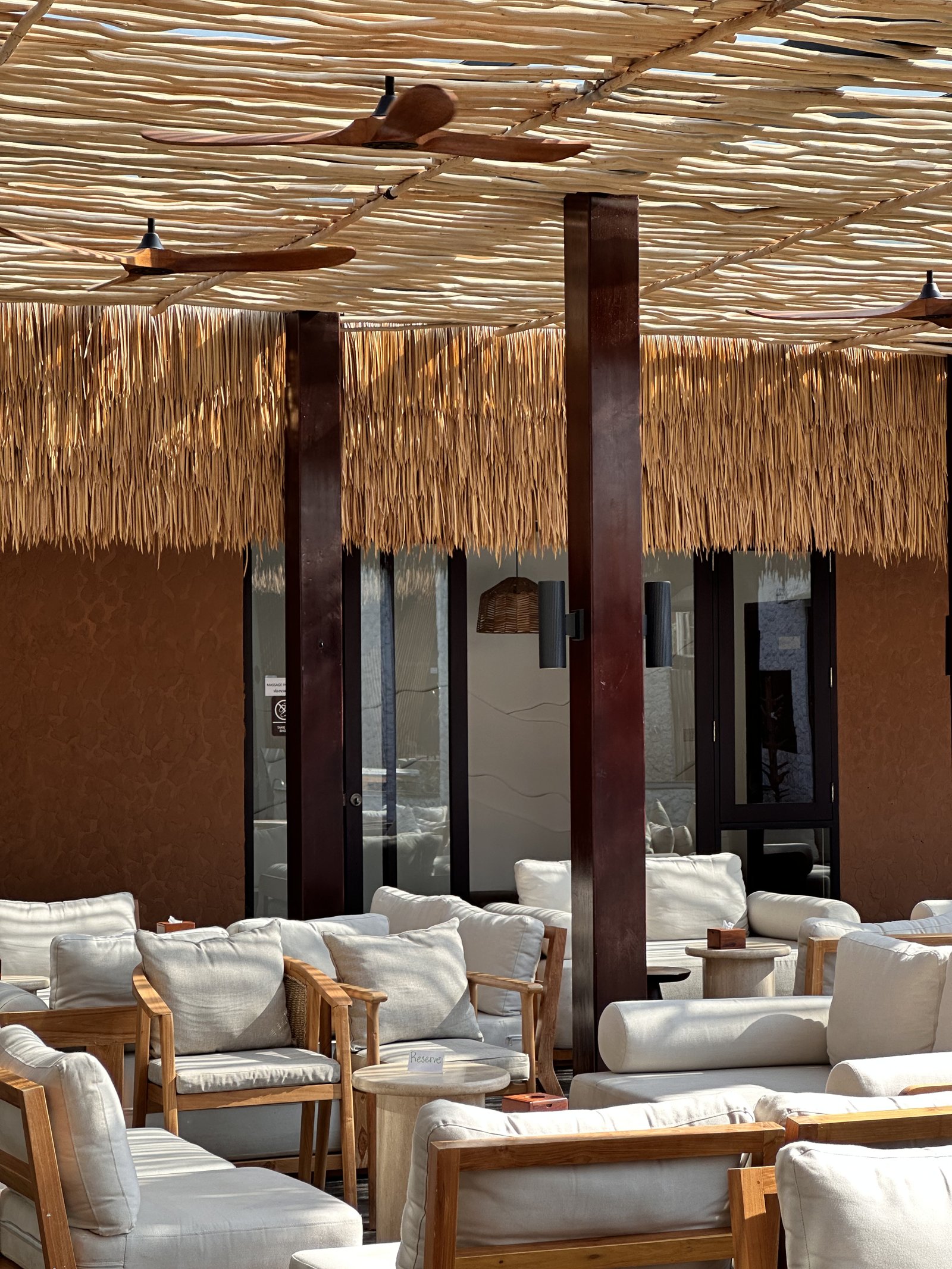 Thatched-roof lounge area at ZIMA Spa & Wellness, Rawai, Phuket